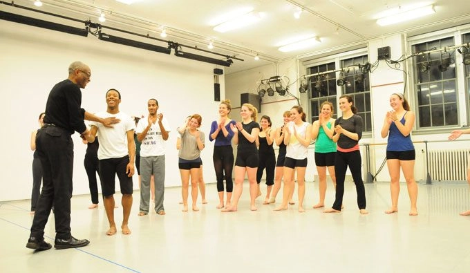 dancers in studio clapping